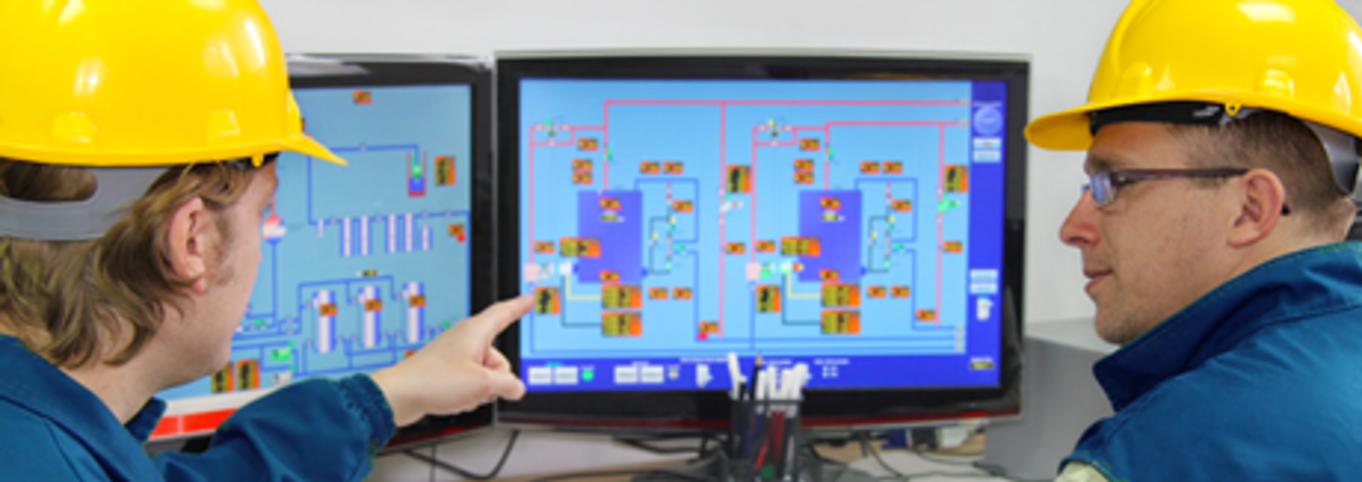 Industrial Workers In Control Room460x163